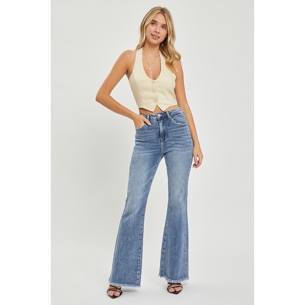 Risen Faye Jeans detail view in medium wash — high rise waistband and flare leg from Thread & Clover boutique