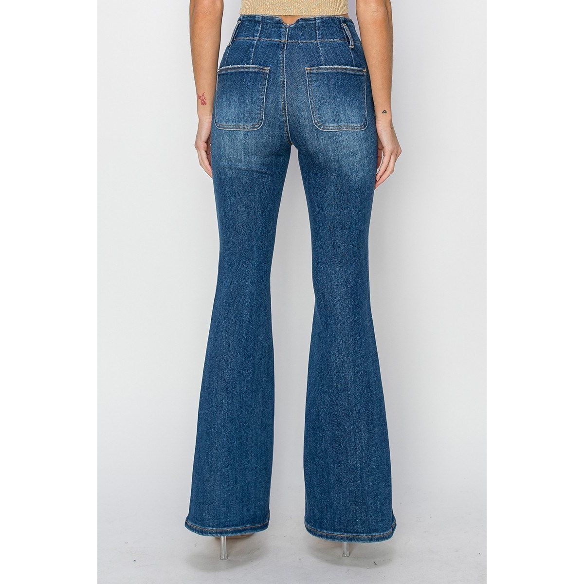 Risen Pennie Jeans detail in dark wash — high rise waistband and flare hem from Thread & Clover boutique