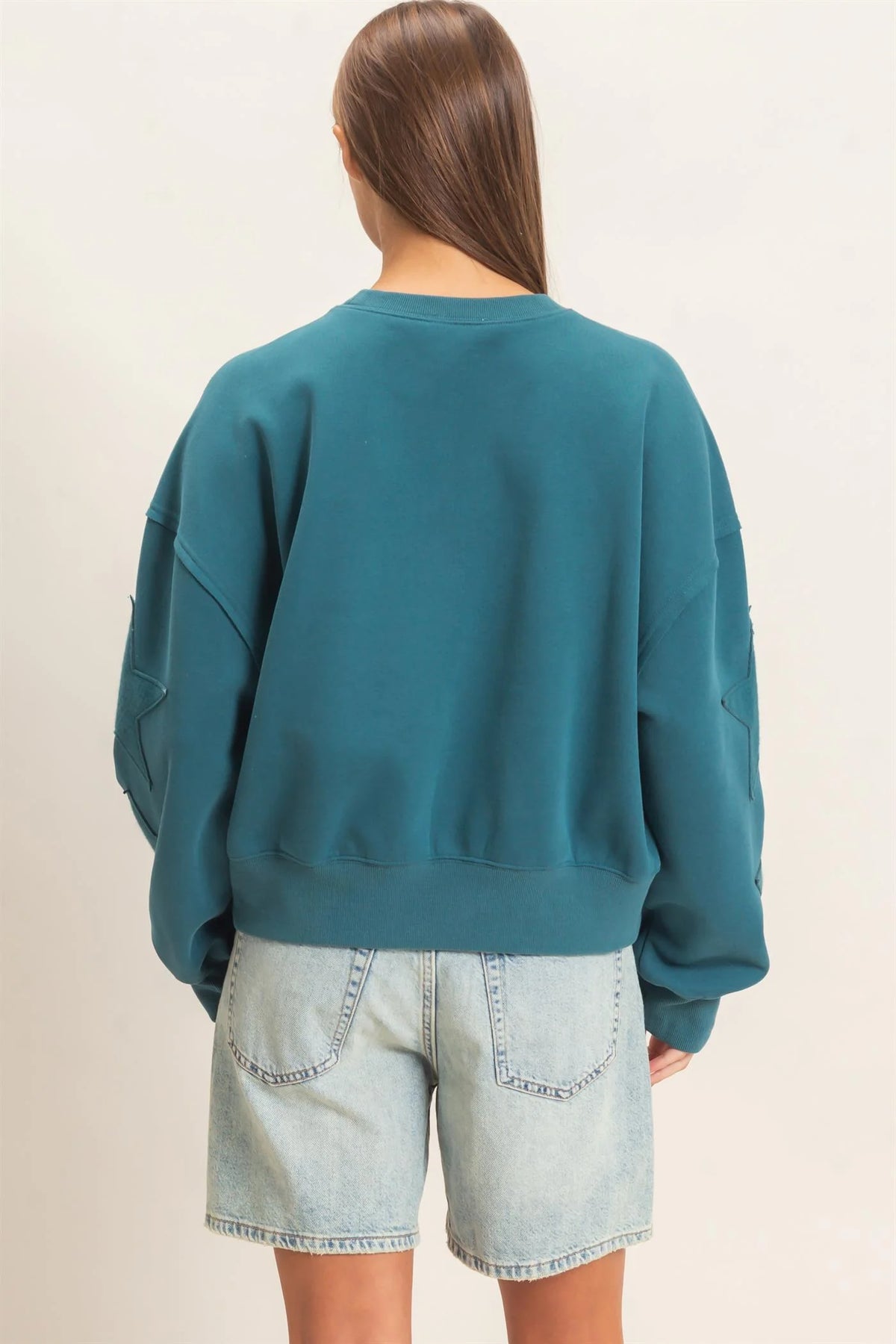 Starlight Sleeve Sweatshirt in Dark Teal — star sleeve detail sweatshirt from Thread & Clover boutique